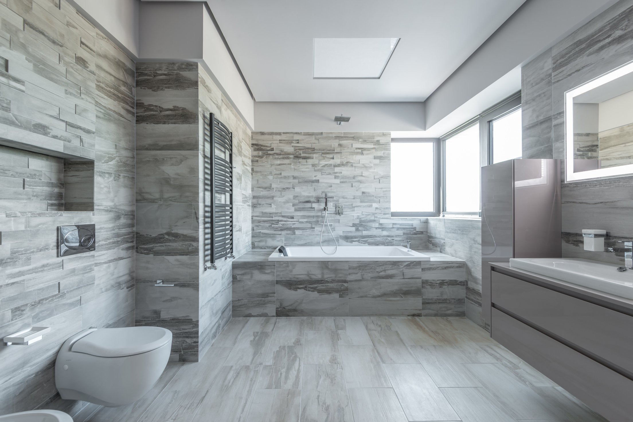 Gray and White Tiled Bathroom