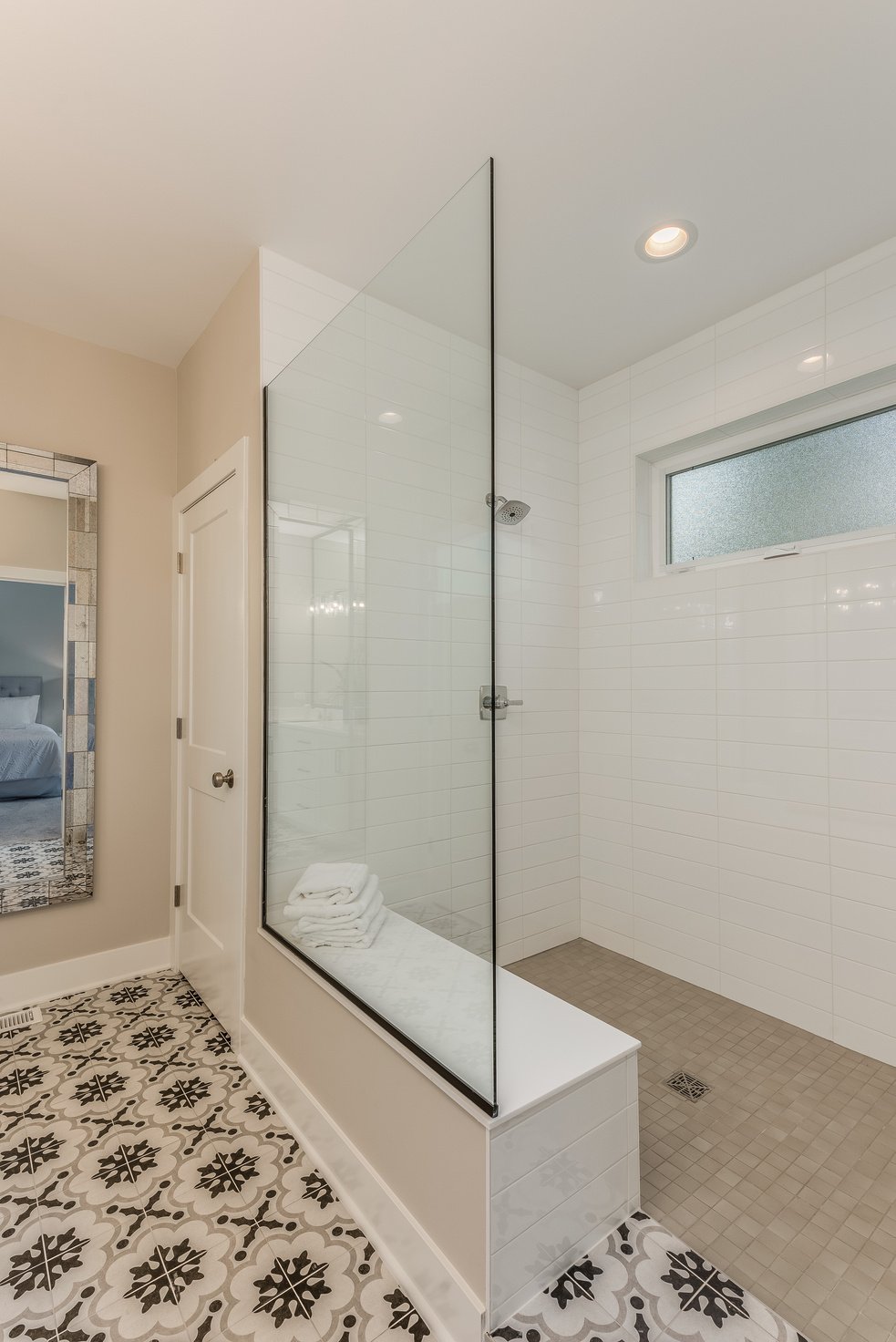 Great walk-in shower with bench for convenience